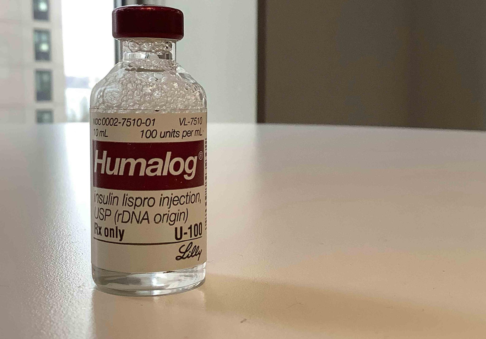 This Wednesday, March 1, 2023 photo shows a vial of Eli Lilly's Humalog insulin in New York. Eli Lilly will cut prices for some older insulins later this year and immediately give more patients access to a cap on costs they pay to fill prescriptions. 