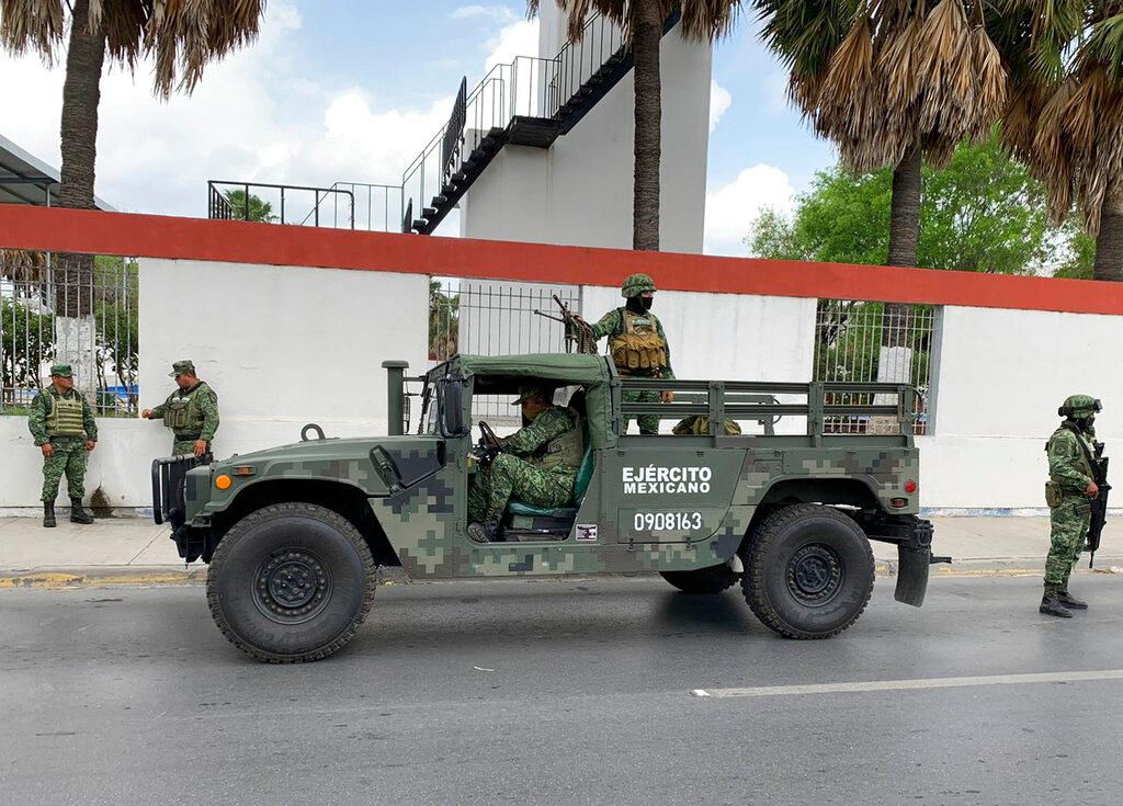 Mexican army soldiers prepare a search mission for four U.S. citizens kidnapped by gunmen at Matamoros, Mexico