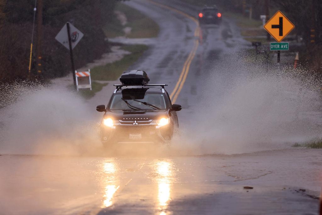 Atascadero Creek begins to flood at Graton Road between Graton and Occidental, Calif., Thursday, March 9, 2023. 