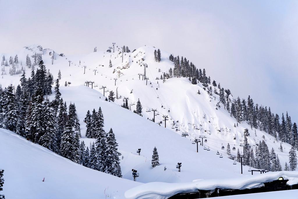 This photo provided by Palisades Tahoe shows a freshly covered snowfall on a ski run at Palisades Tahoe ski resort in Olympic Valley, Calif.