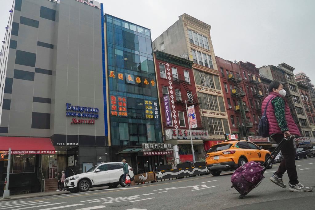 A six story glass facade building, second from left, is believed to be the site of a foreign police outpost for China in New York's Chinatown,