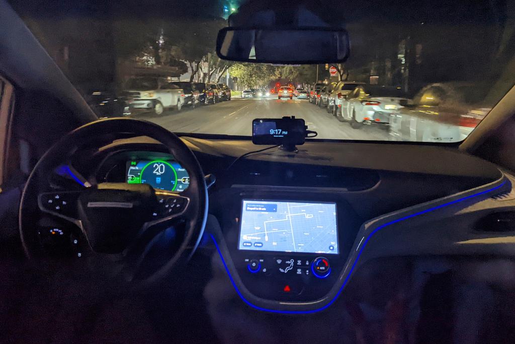 The empty driver's seat is shown in a driverless Chevy Bolt car named Peaches carrying Associated Press reporter Michael Liedtke during a ride in San Francisco