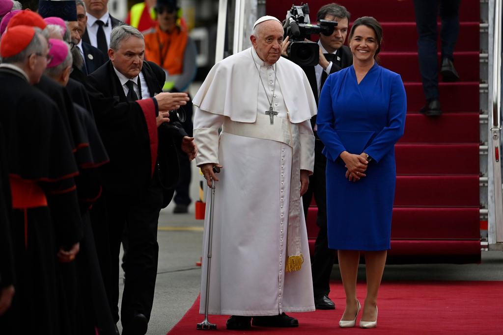 Pope Francis is greeted by Hungary President Katalin Novak