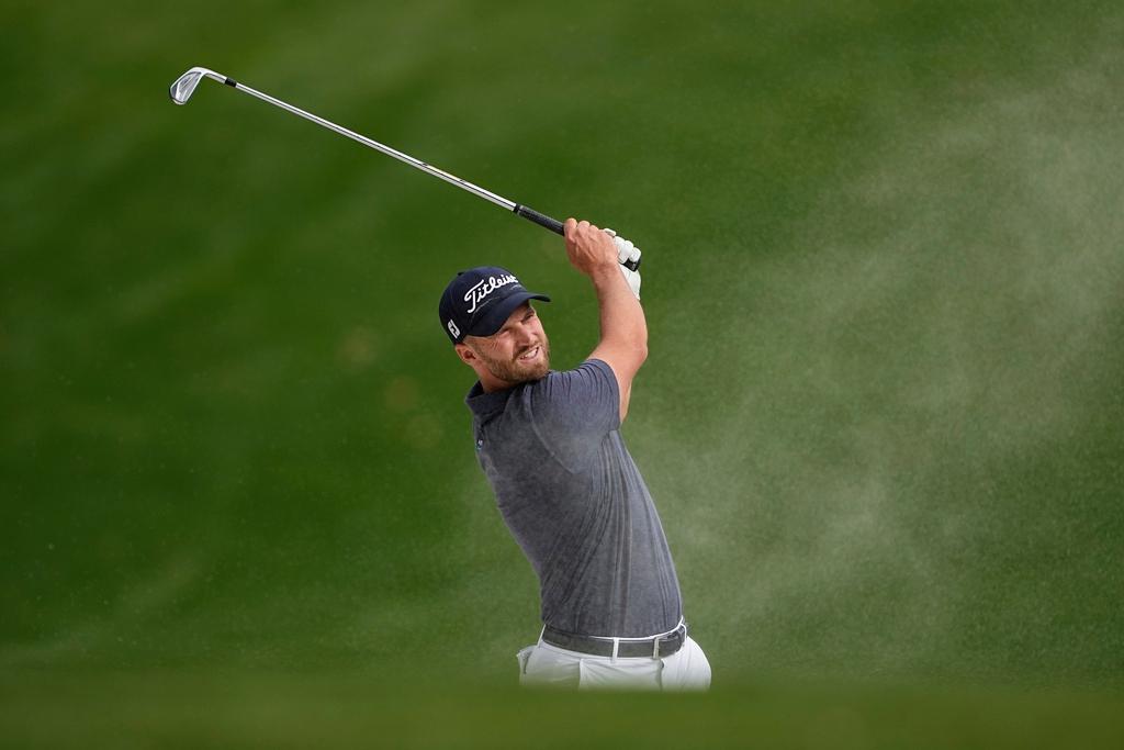 Wyndham Clark hits from a bunker on the 15th hole during final round of the Wells Fargo Championship golf tournament at the Quail Hollow Club on Sunday, May 7, 2023, in Charlotte, N.C.