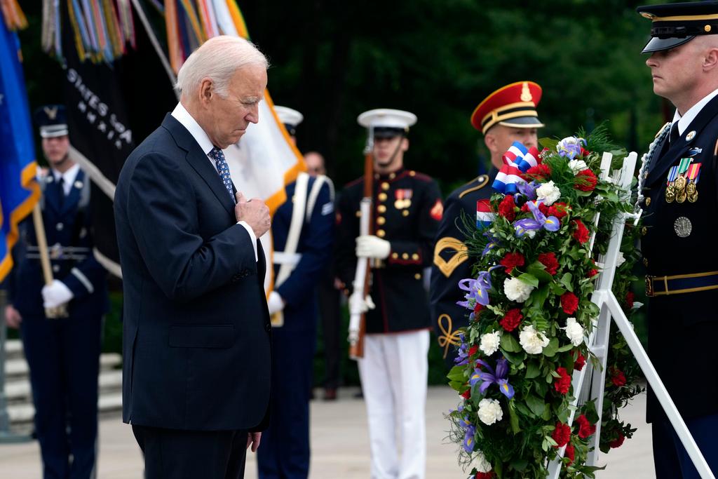 President Joe Biden pauses after laying a wreath at The Tomb of the Unknown Soldier at Arlington National Cemetery in Arlington, Va., on Memorial Day, Monday, May 29, 2023.