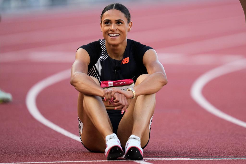 Sydney McLaughlin-Levrone smiles as she catches her breath after winning the women's 400 meter final during the U.S. track and field championships in Eugene, Ore.