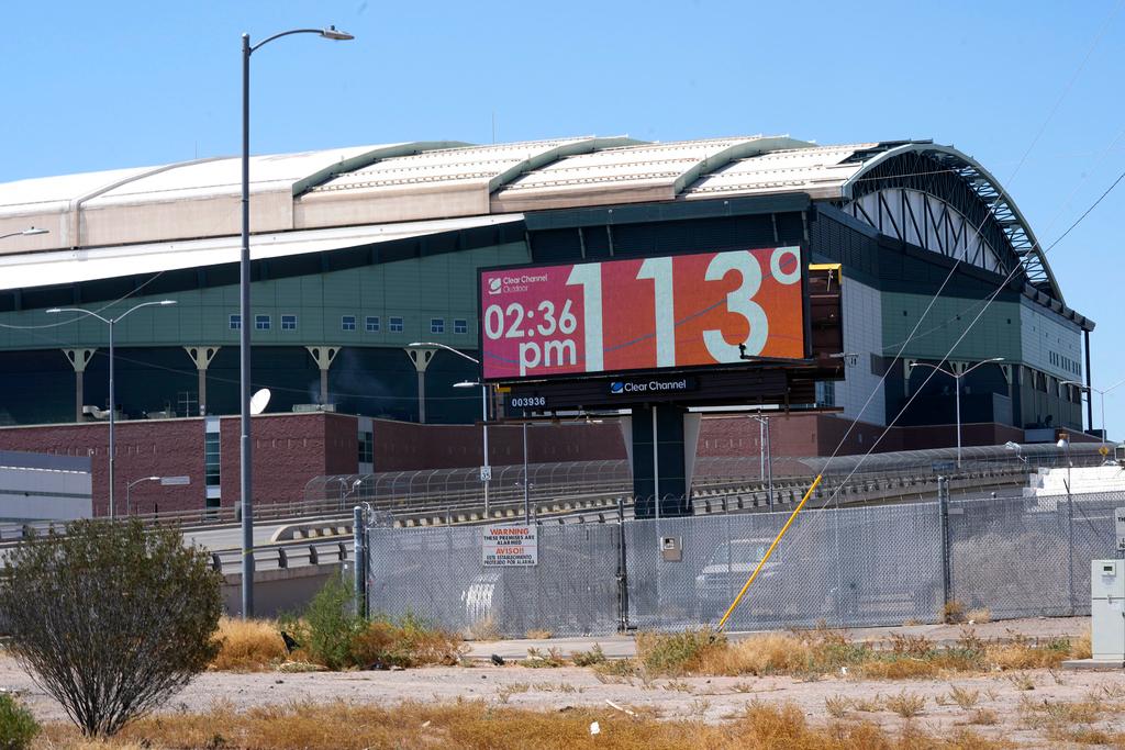 Digital billboard updates the time and temperature in Phoenix, AZ