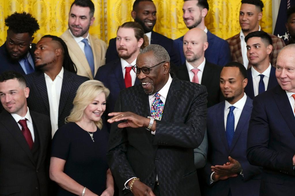 Houston Astros manager Dusty Baker Jr., center, arrives during an event celebrating the 2022 World Series champion Houston Astros baseball team in the East Room of the White House