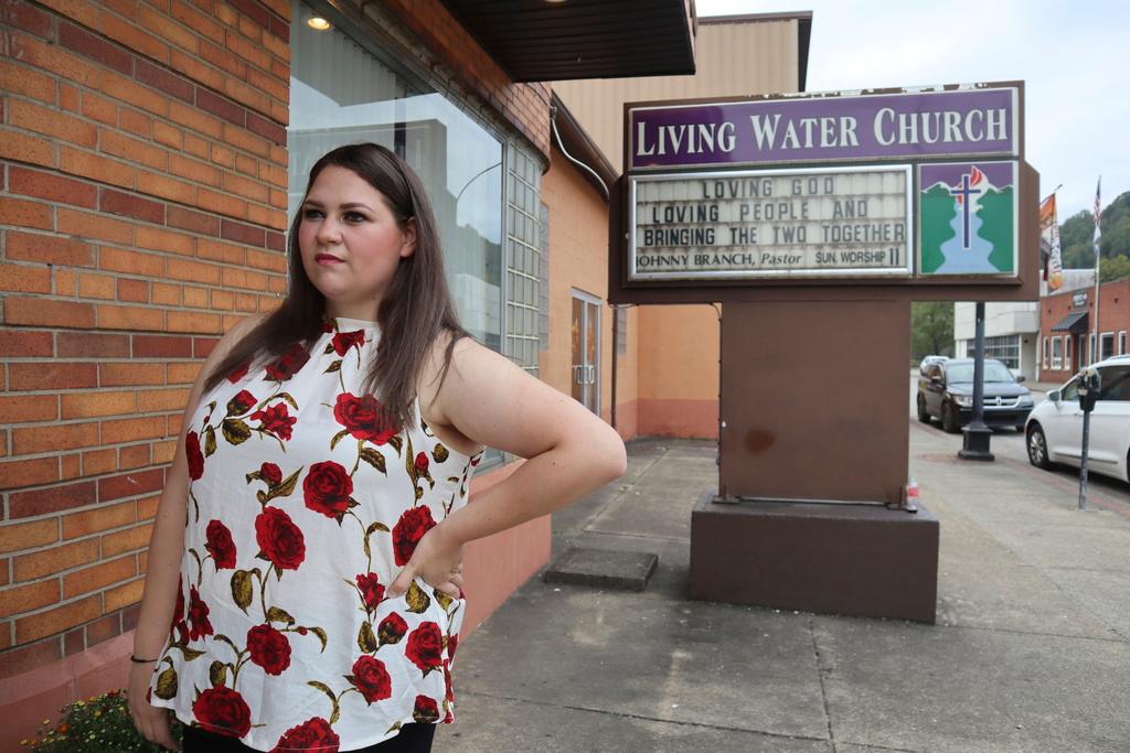 Mother of three Kaitlyn Adkins, an Appalachian School of Law student, speaks about the necessity of child care access for parents working a job or toward agree after dropping off her kids at Living Water Child Care and Learning Center in Williamson, W.Va. on Monday, Sept. 25, 2023.