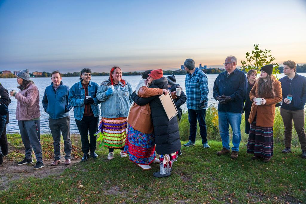 People attend an Indigenous Peoples Day Sunrise Ceremony at Bde Maka Ska in Minneapolis, Minnesota  