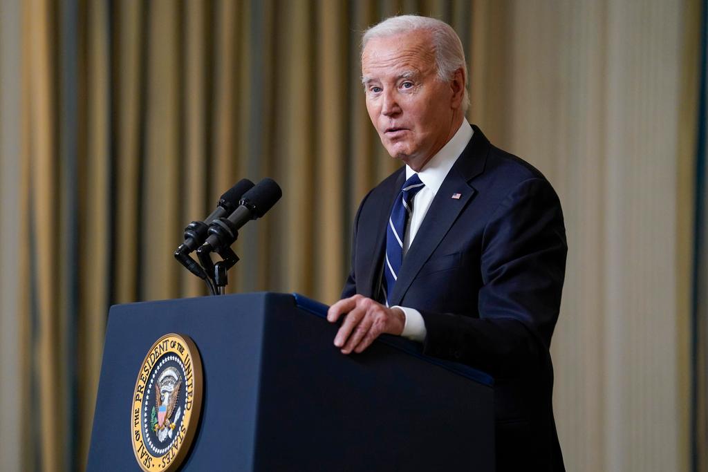 President Joe Biden in the State Dining Room of the White House