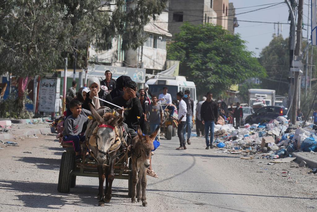 Palestinians fleeing from northern Gaza to the south after the Israeli army issued an unprecedented evacuation warning to a population of over 1 million people