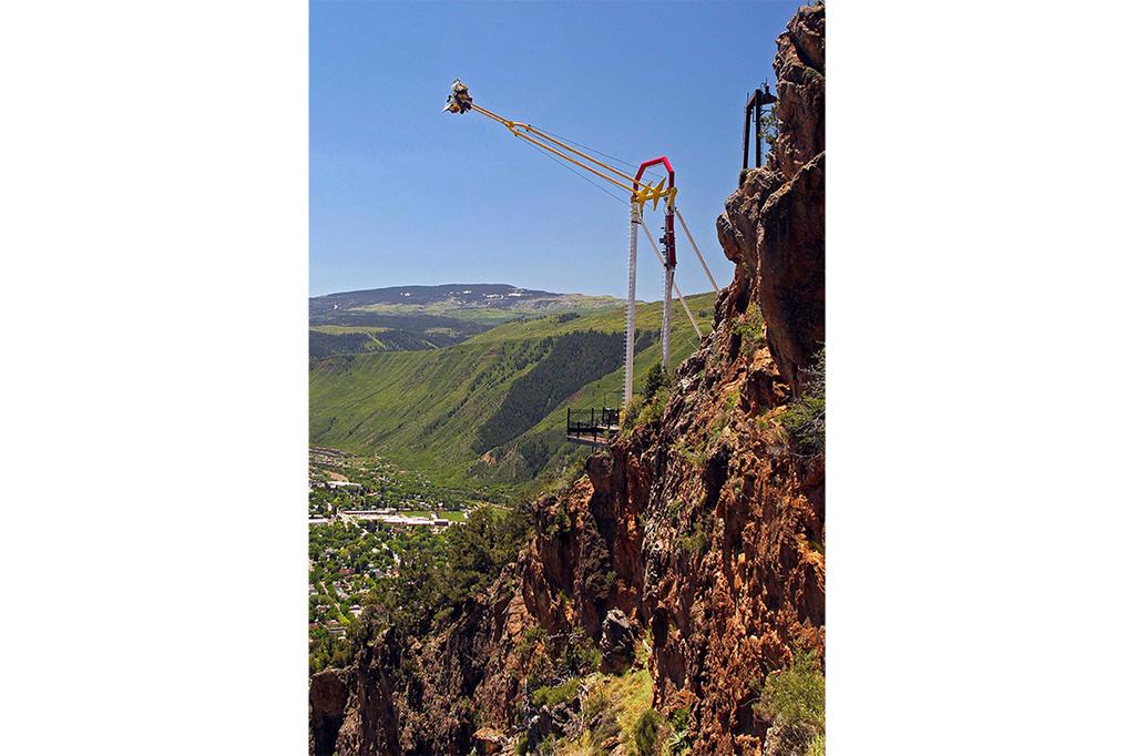 People ride the Giant Canyon Swing at Glenwood Caverns Adventure Park in Glenwood Springs, Colo.