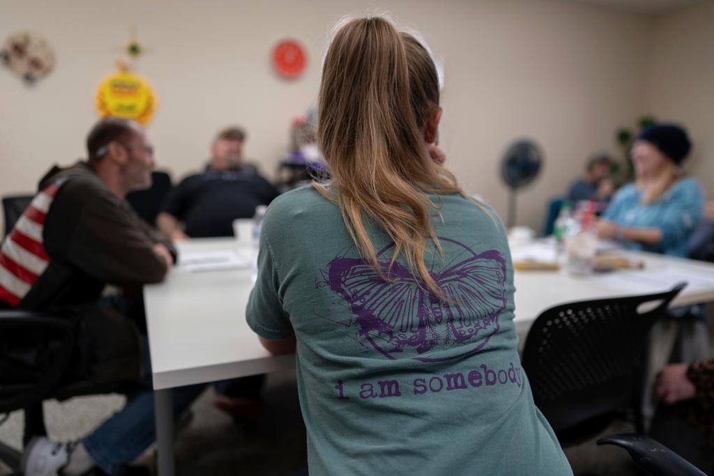 Clients and staff gather at FOCUS Recovery and Wellness Community Center