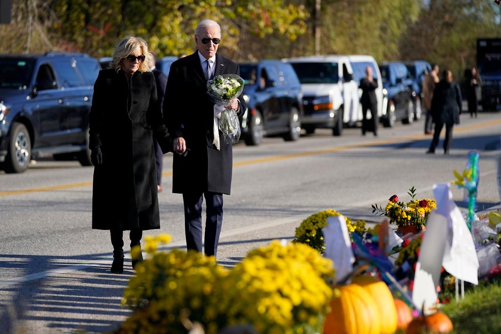 President Joe Biden and First Lady Jill Biden lay flowers at memorial