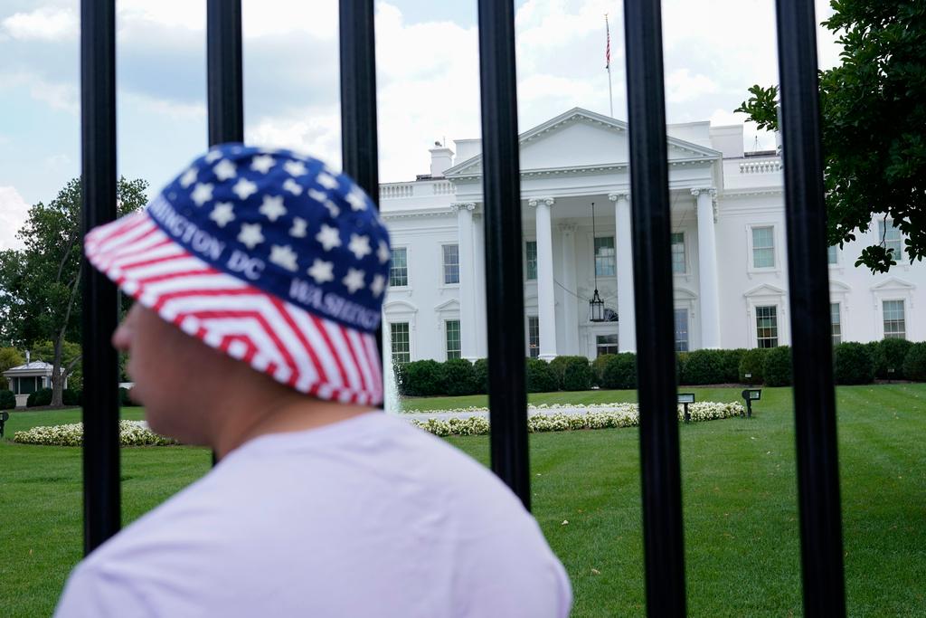 FILE - The North Lawn of the White House is seen from a newly reopened section of Pennsylvania Avenue, July 4, 2021, in Washington. A White House tour is practically a must-do in Washington, though the experience can leave some guests asking questions about spaces they don’t get to see, like the Oval Office. The White House Historical Association has a plan to answer those questions when it opens “The People’s House: A White House Experience,” in the fall of 2024. 