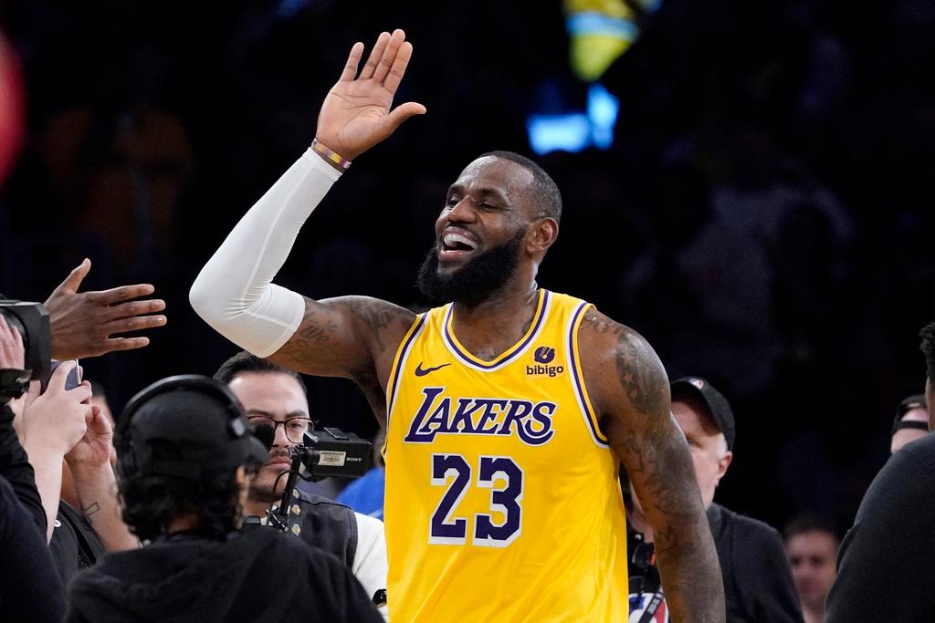 Los Angeles Lakers forward LeBron James celebrates after the Lakers defeated the Los Angeles Clippers in an NBA basketball game