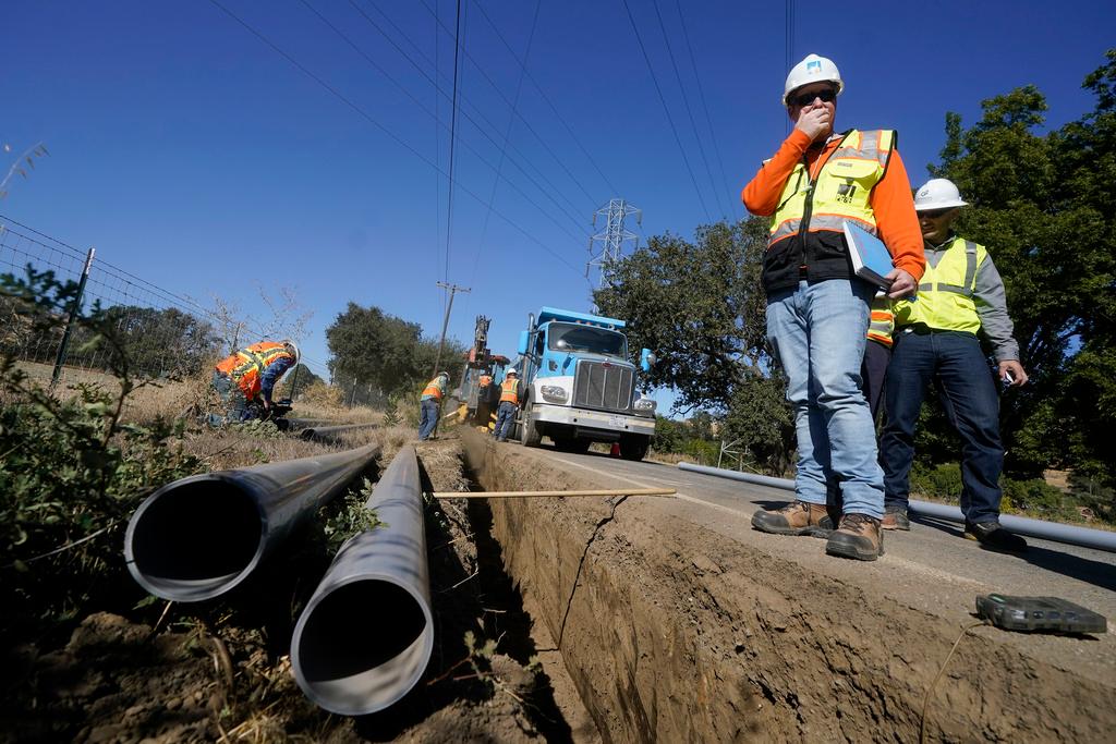 Pacific Gas and Electric crew bury power lines in Vacaville, California