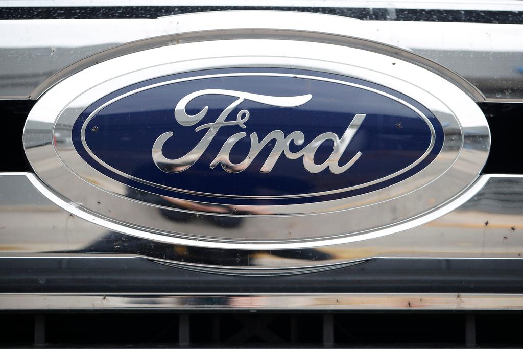 This Oct. 20, 2019 file photo shows the Ford company logo at a Ford dealership in Littleton, Colo. 