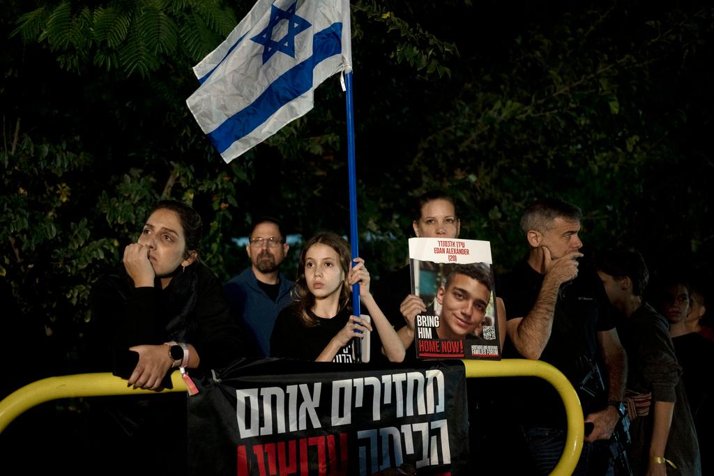 Families of hostages held by Hamas since Oct. 7 in the Gaza Strip and their supporters take part in a rally during their march from Tel Aviv to Jerusalem