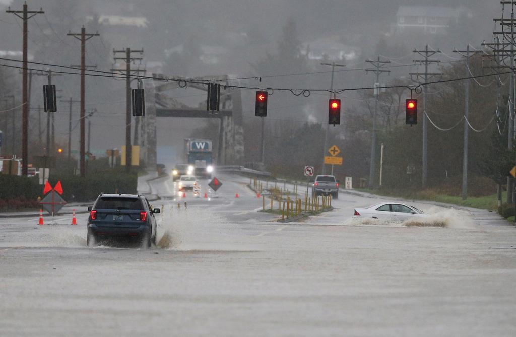 Heavy rain causes high water and flooding along Highway 101 in Tillamook, Oregon