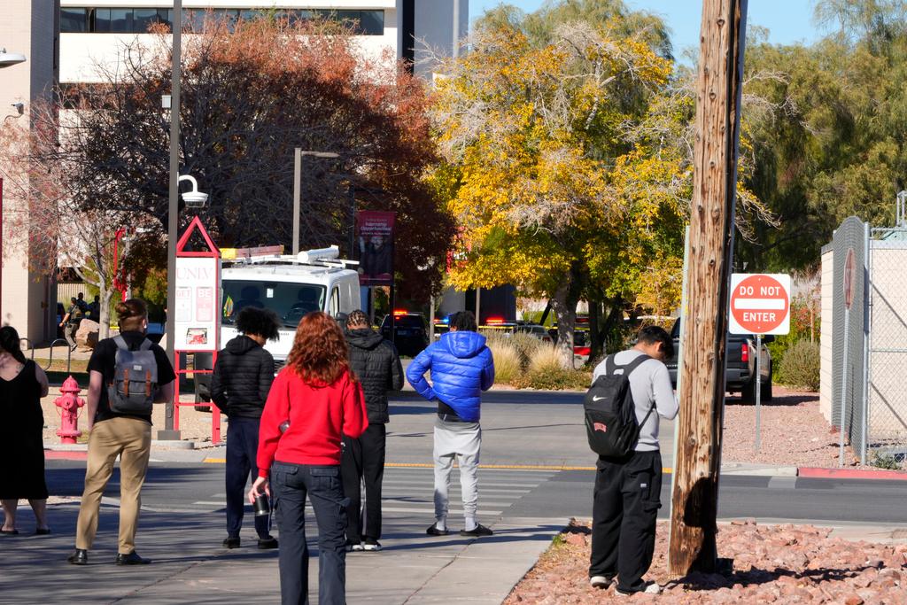 University of Nevada, Las Vegas, students observe police activity after a shooting reported on campus