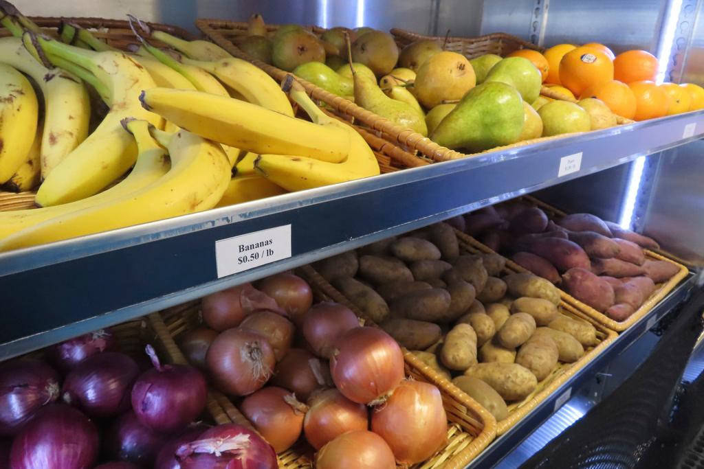 Fresh produce lines the shelves of a specially modified bus that serves as a mobile supermarket in Atlantic City N.J.