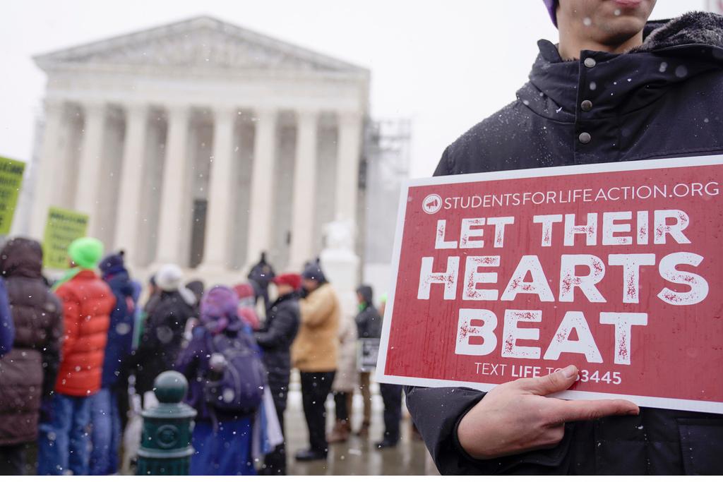 “Roe is done, but we still live in a culture that knows not how to care for life,” said Benjamin Watson, a former NFL player 