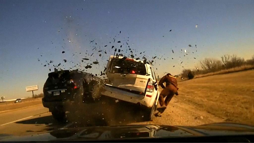 Screen grab taken from dash camera video provided by the Oklahoma Highway Patrol shows Trooper Jesse Gregory