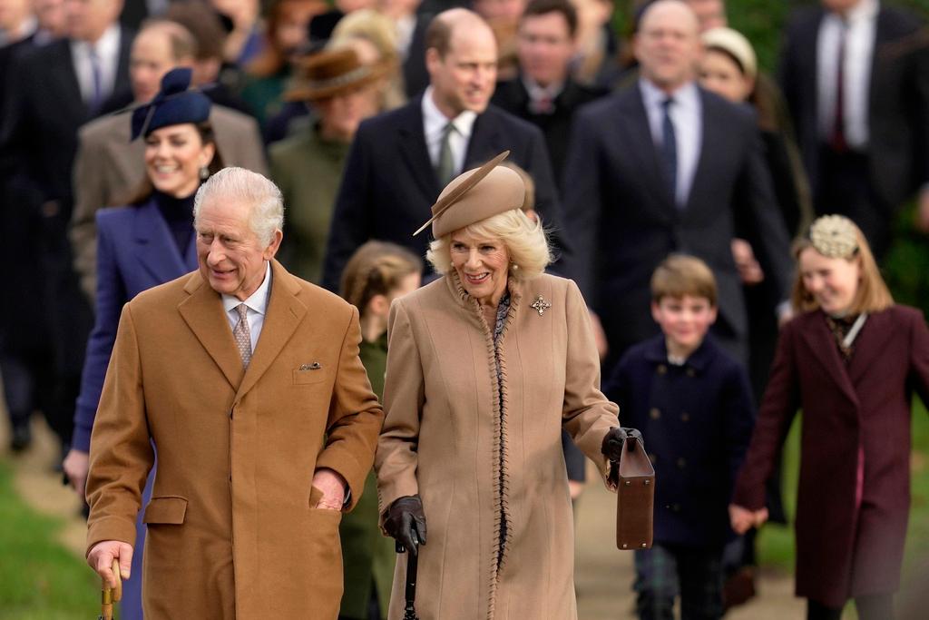 Britain's King Charles III and Queen Camilla arrive to attend the Christmas day service at St Mary Magdalene Church in Sandringham 