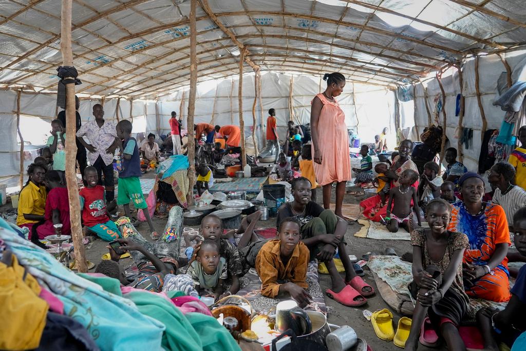 South Sudanese shelter in a transit center in Renk, South Sudan Wednesday, May 17, 2023.