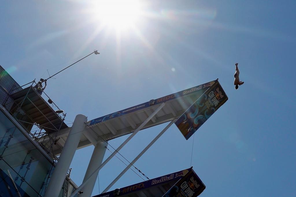 Aidan Heslop. of the United Kingdom, competes in the Red Bull Cliff Diving World Series in Boston