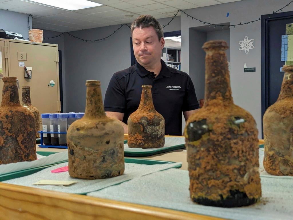 Archeologist Jason Boroughs discusses artifacts found underneath George Washington's residence in Mount Vernon, Va.