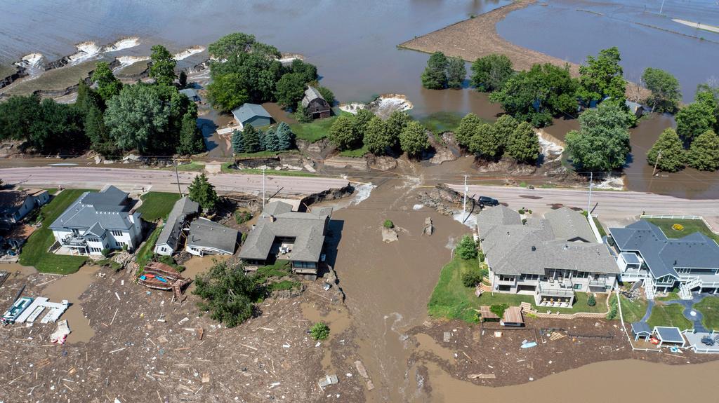 Flooding from the Big Sioux River damages roads and buildings in North Sioux City, S.D., on Monday, June 24, 2024.