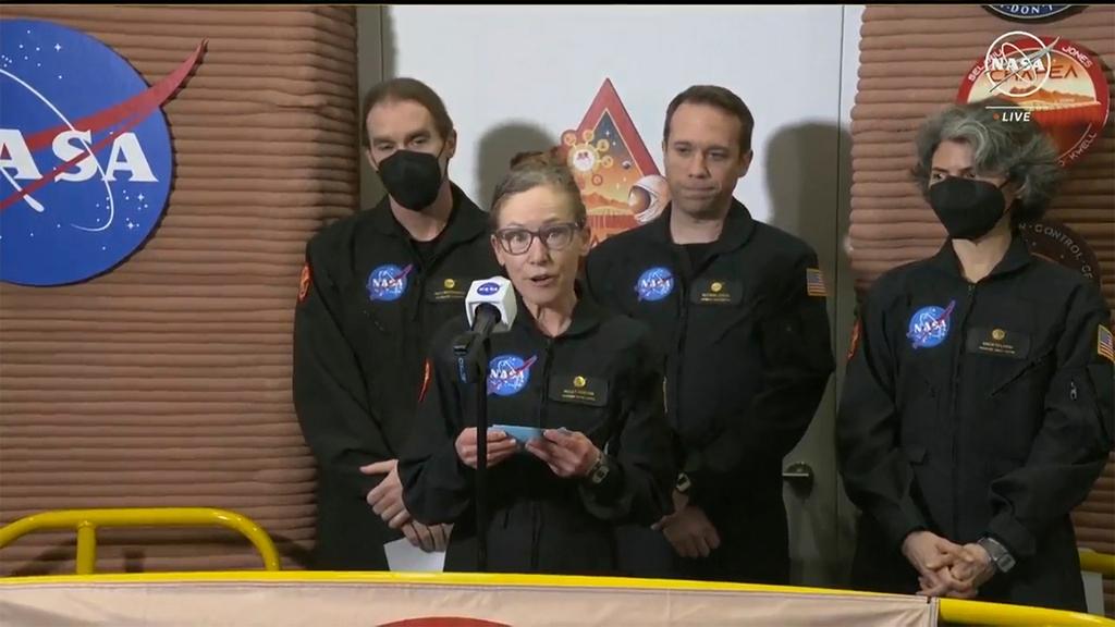  Kelly Haston, a crew member of the first CHAPEA mission, speaks in front of other members, from left to right, Ross Brockwell, Nathan Jones, and Anca Selariu, Saturday, July 6, 2024, at Johnson Space Center in Houston, Texas