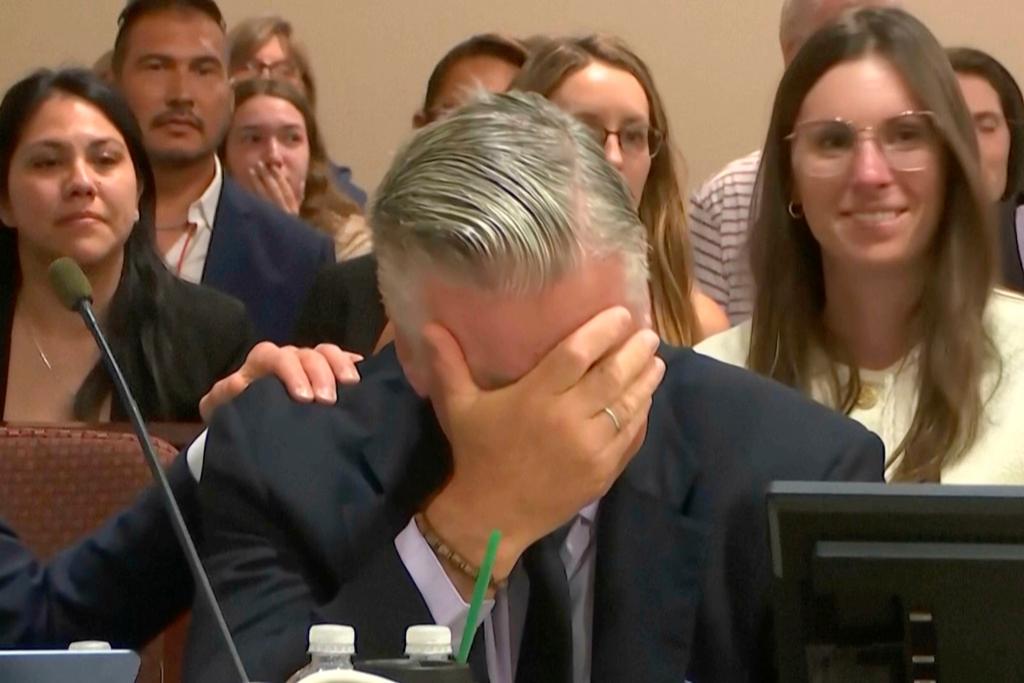 Actor Alec Baldwin reacts after the judge threw out the involuntary manslaughter case for the 2021 fatal shooting of cinematographer Halyna Hutchins during filming of the Western movie "Rust"