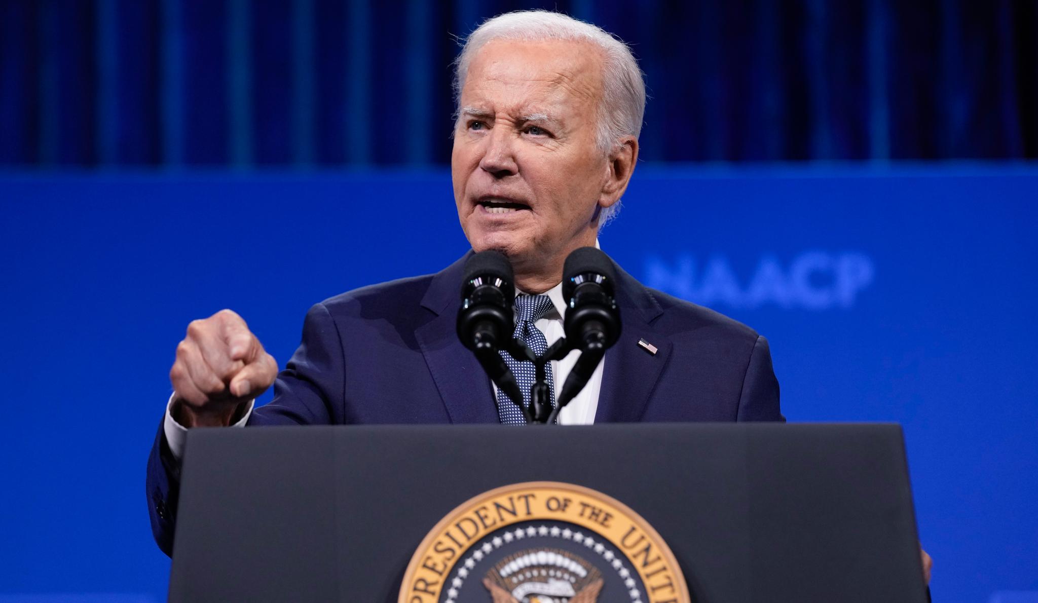 Pres. Biden behind a podium