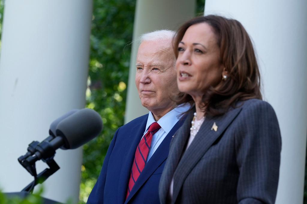 (May, 2024)  President Joe Biden listens as Vice President Kamala Harris speaks in the Rose Garden