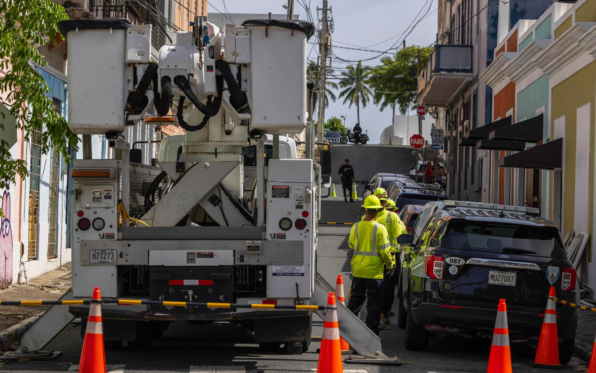 Power employees on a residential street