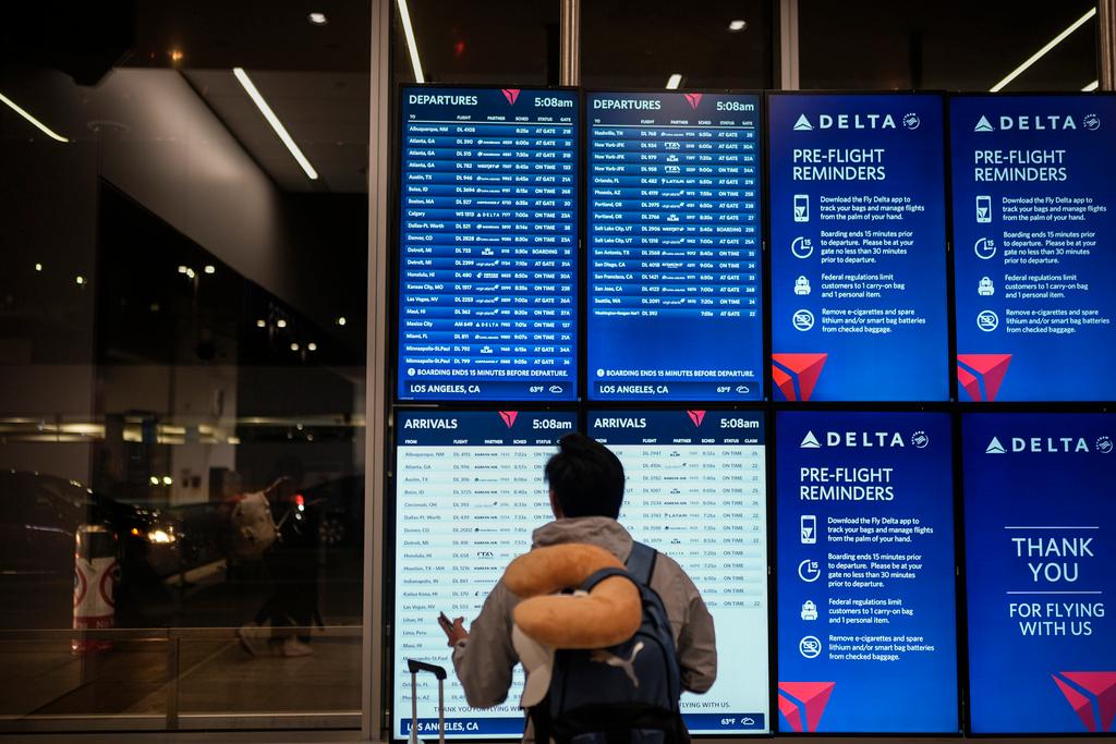 Flight information screen in the Delta Airlines ticketing area at the Los Angeles International Airport