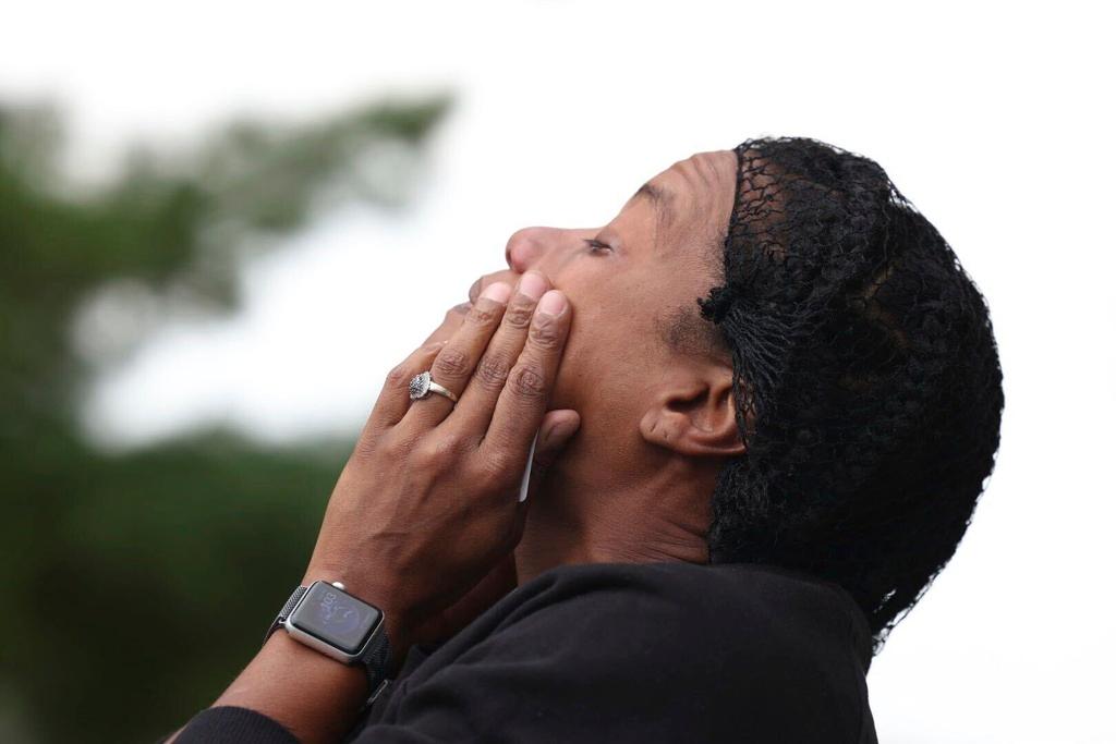 Pamela Caraballo, who has a child at the Northwest High School, reacts as she waits outside the school for students to be released after a shooting was reported Tuesday, Sept. 10, 2024, in Omaha, Neb.