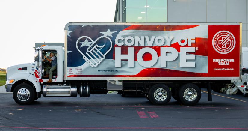 Red, white and blue Convoy of Hope semi truck