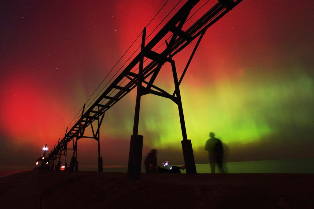 Aurora borealis lights up the night sky off Lake Michigan in St. Joseph, Mich.