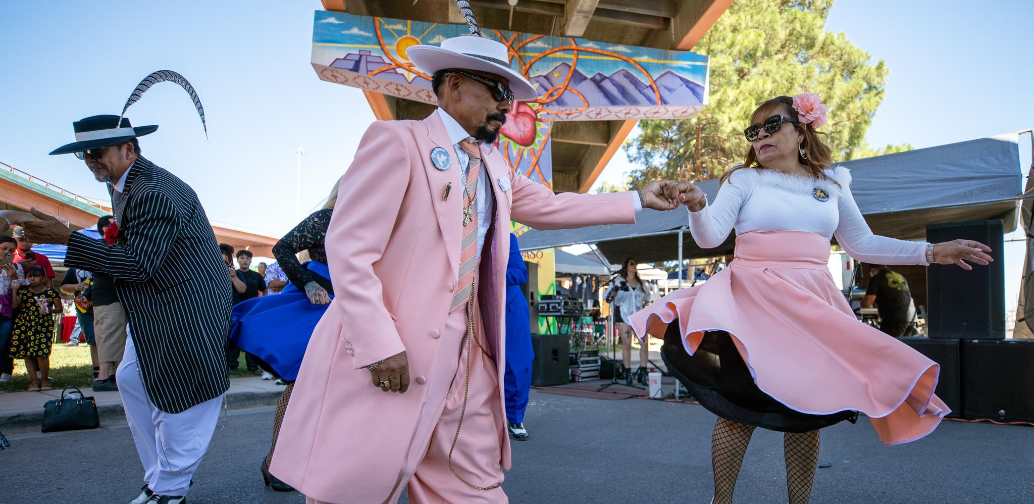 Men and women in Zoot suits, dancing