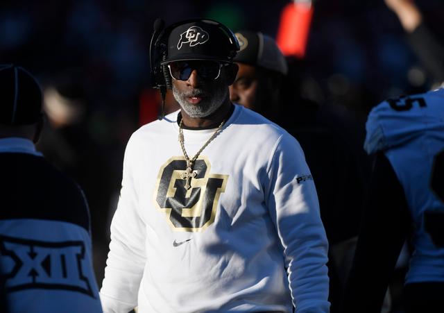 Colorado's head coach Deion Sanders walks along the sidelines during the second half of an NCAA college football game against Texas Tech, Saturday, Nov. 9, 2024, in Lubbock, Texas. 