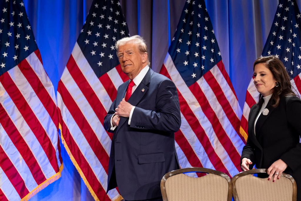 President-elect Donald Trump arrives to speak at a meeting of the House GOP conference, followed by Rep. Elise Stefanik, R-N.Y., Wednesday, Nov. 13, 2024, in Washington. 