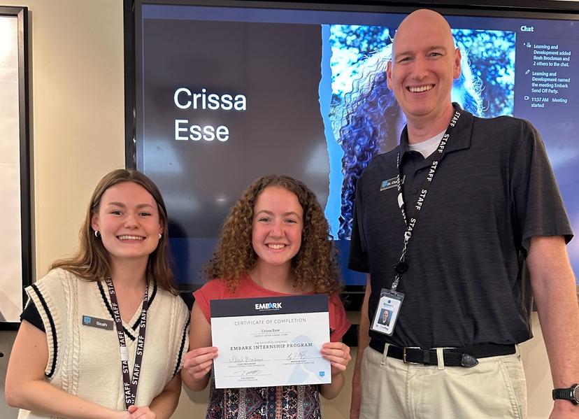 Completing the Answers in Genesis Internship-- Crissa receiving her internship completion certificate with Dr. Tim Chaffey, Answers in Genesis' content manager and college connector supervisor, Leah Brockman