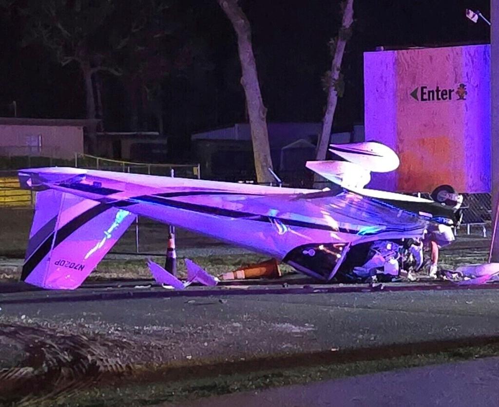 A single engine fixed-wing airplane lies upside down after it crashed on West White Dogwood Drive near the intersection of US-98 in Homosassa, Fla