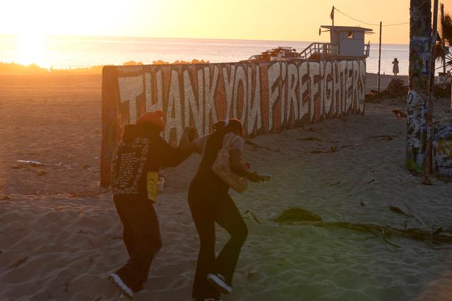 A mural by Sergei Statsenko, who also goes by the artist name Steeke, thanks firefighters in the Venice Beach area of Los Angeles 