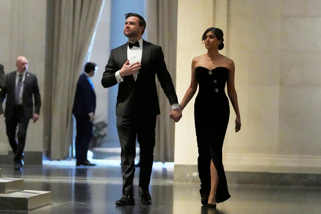 Vice President-elect JD Vance and his wife, Usha Vance, arrive to a dinner event at the National Gallery of Art in Washington